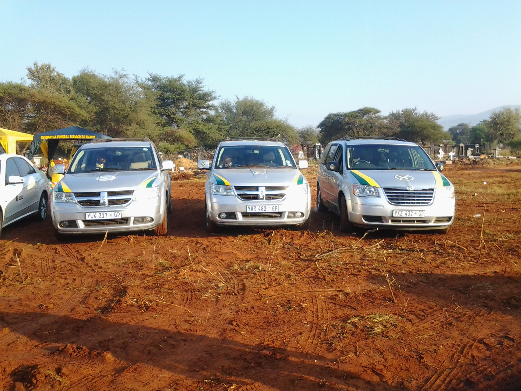 Senatla Funeral Services vehicles arriving at a cemetery